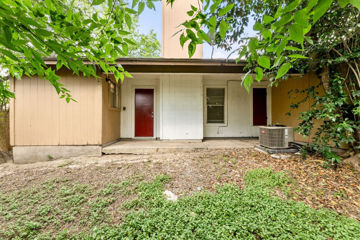 818 Sirocco Drive, Unit B Austin, TX 78745 - Photo 30 of 34 a house with a tree in front of it