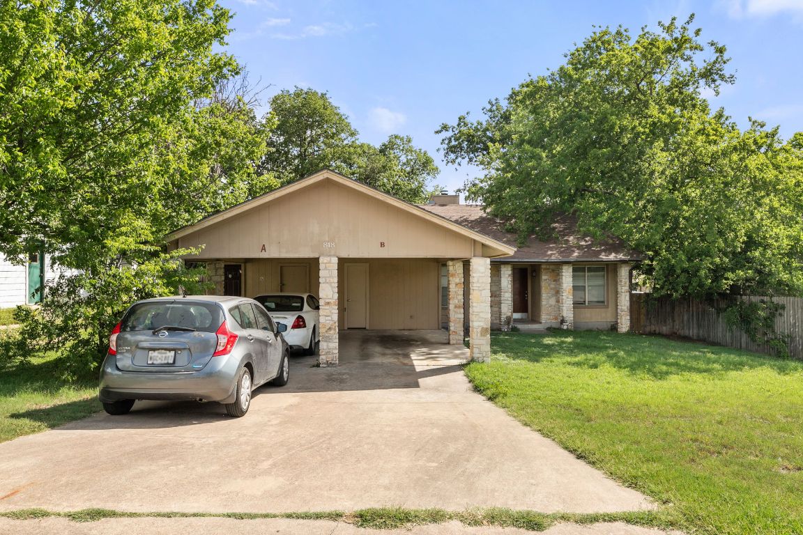 818 Sirocco Drive, Unit B Austin, TX 78745 - Photo 3 of 34 a house view with a garden space