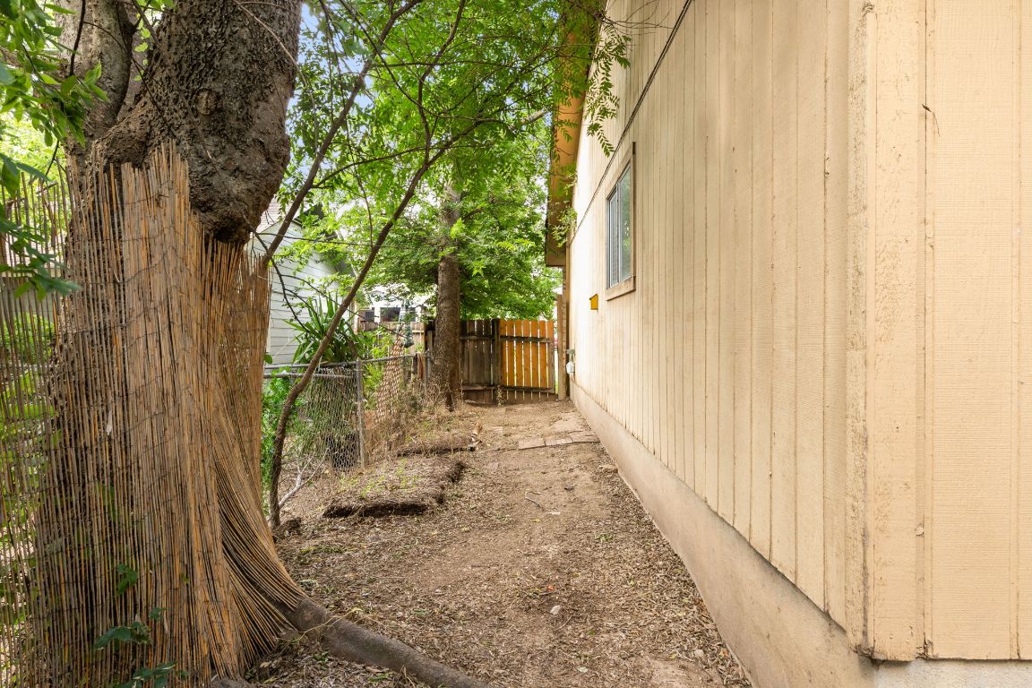 818 Sirocco Drive, Unit B Austin, TX 78745 - Photo 33 of 34 a view of a yard with a trees