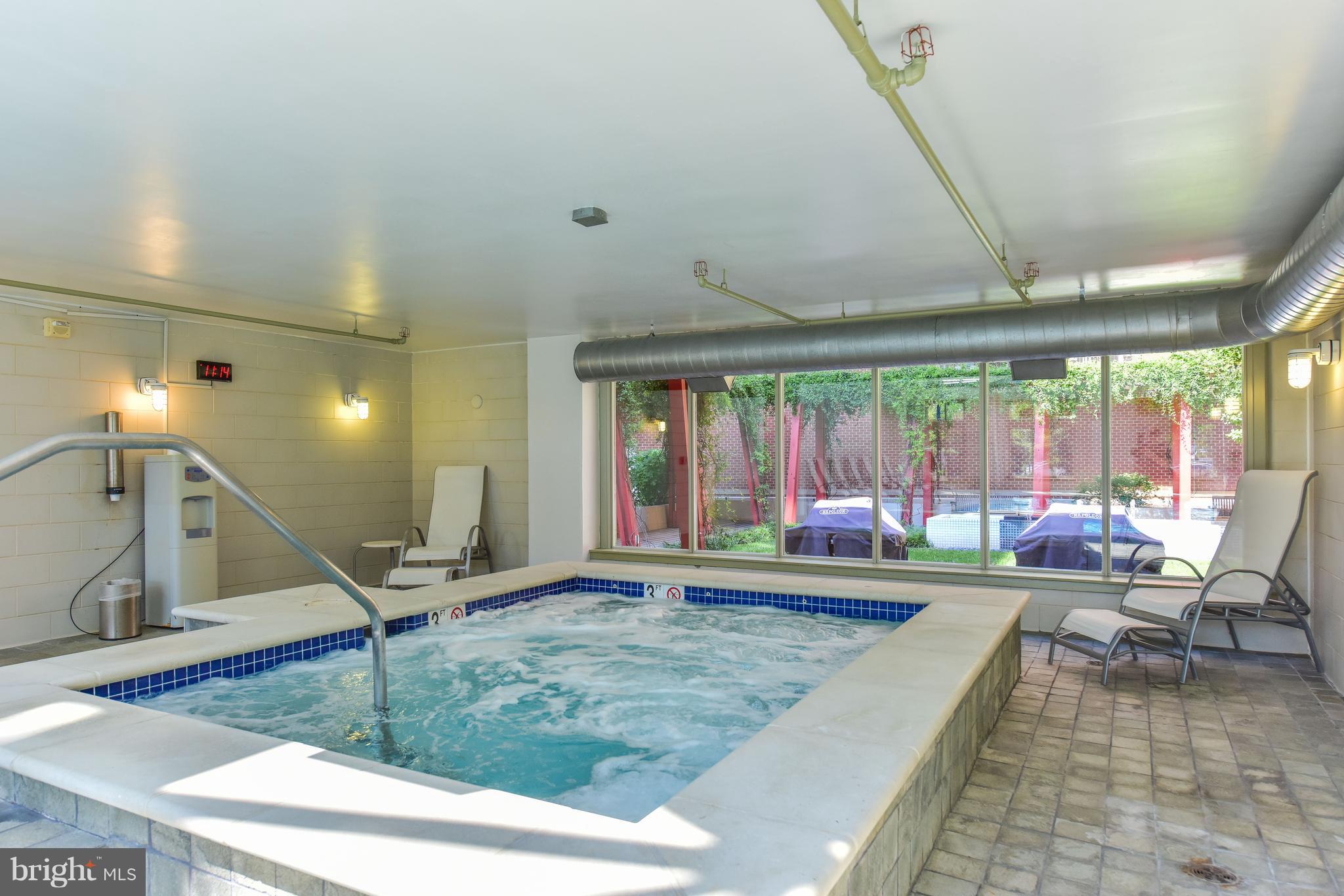 1000 New Jersey Avenue Southeast, Unit 108 Washington, DC 20003 - Photo 11 of 21 a living room with couch and a large window