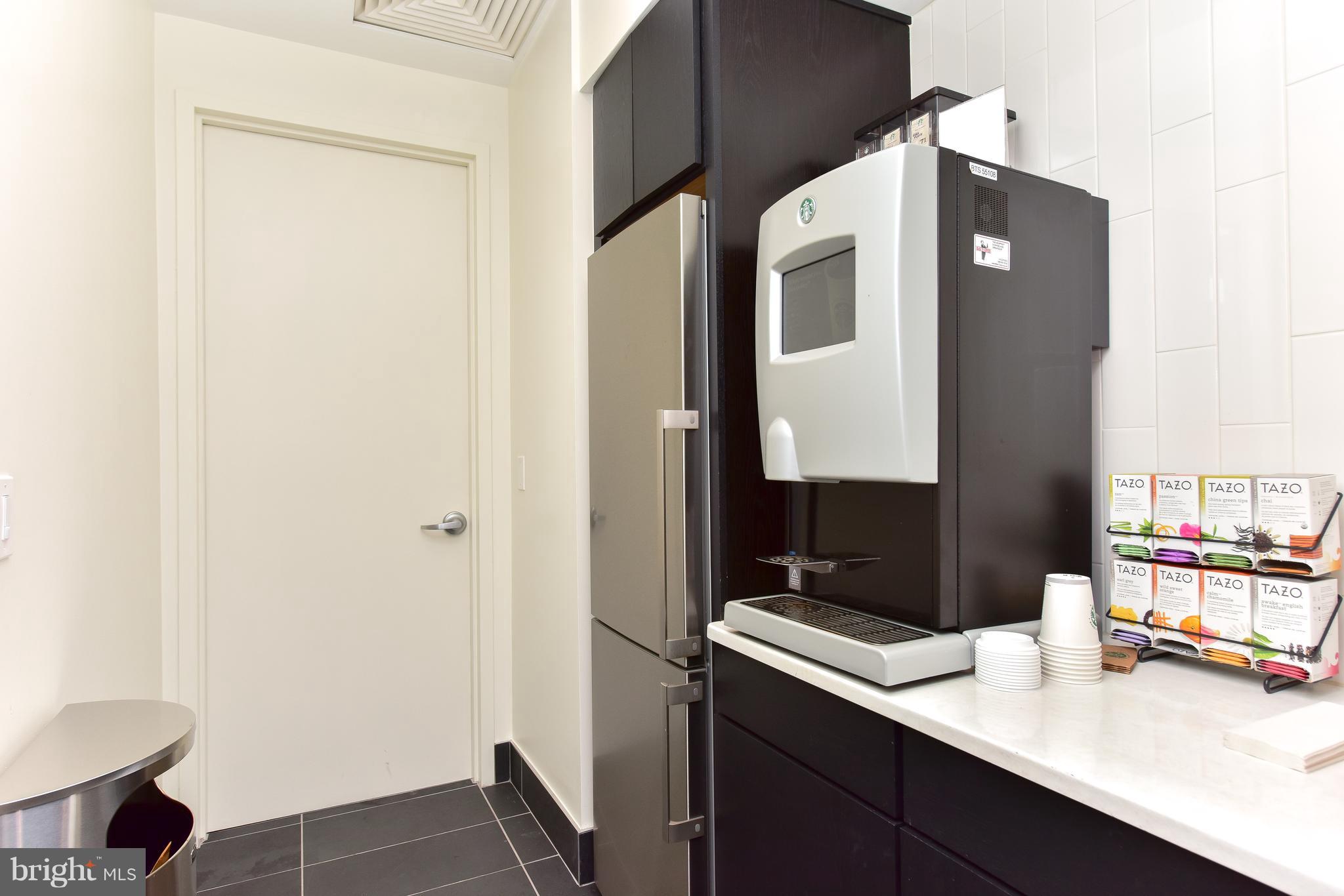 1000 New Jersey Avenue Southeast, Unit 108 Washington, DC 20003 - Photo 16 of 21 a bathroom with a sink vanity and a mirror