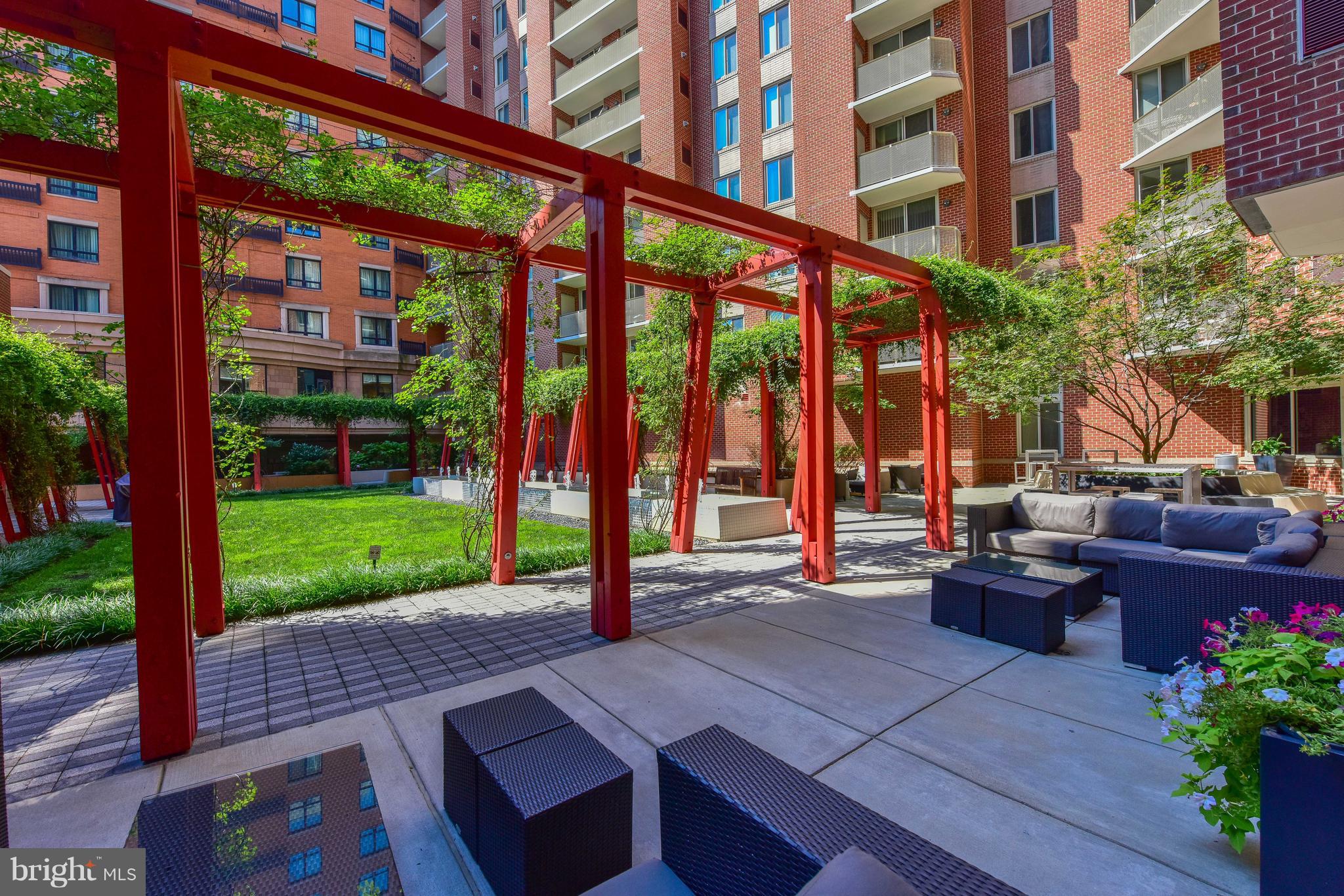 1000 New Jersey Avenue Southeast, Unit 108 Washington, DC 20003 - Photo 20 of 21 a view of a patio with couches plants and garden