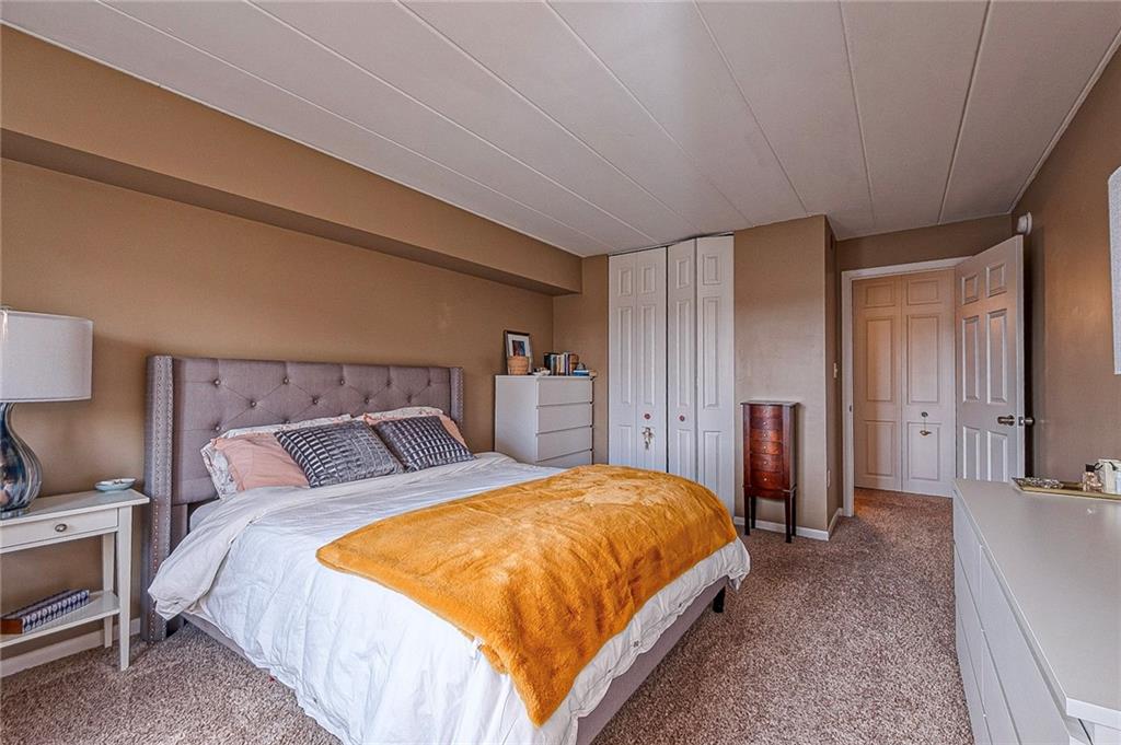 5 Bayard Road, Unit 621 Pittsburgh, PA 15213 - Photo 11 of 38 a bedroom with a bed and a closet