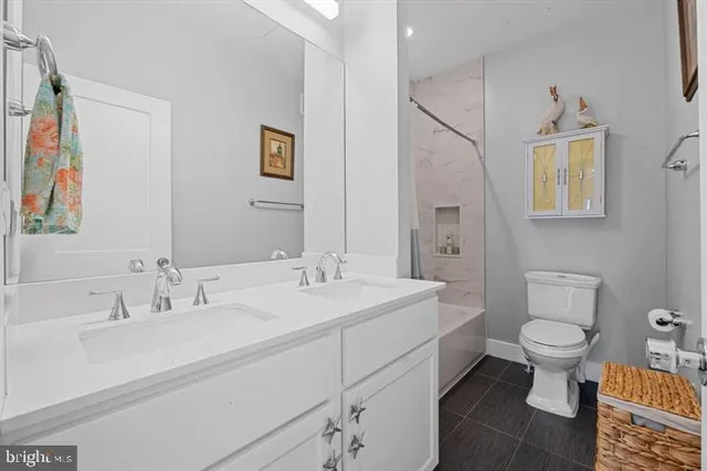 a bathroom with a sink and a toilet