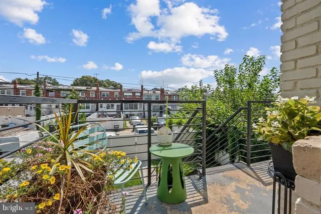 a view of a chairs and table in a patio