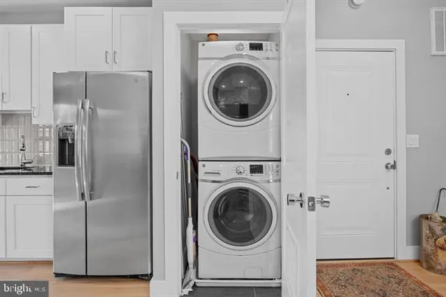 a utility room with dryer and washer