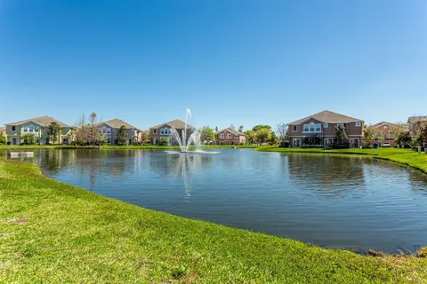 a view of a lake with houses