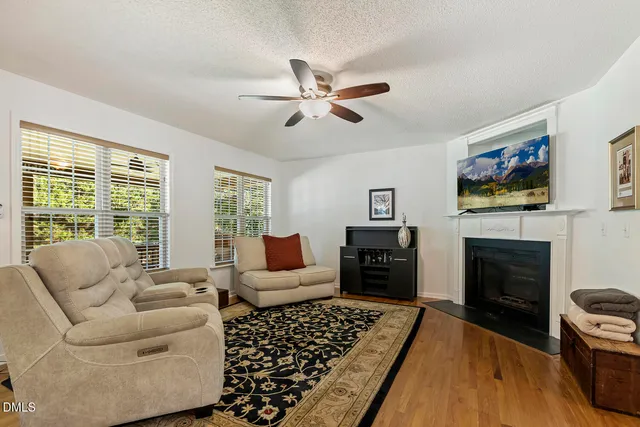 a living room with furniture and a table