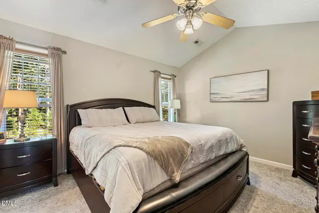 a white bath tub and a window