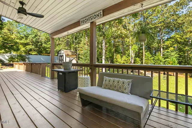 a view of a yard with trees