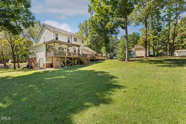 an aerial view of residential house with outdoor space