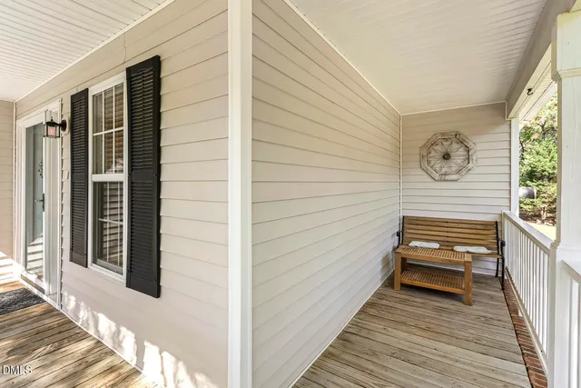 a view of a bench in front of house