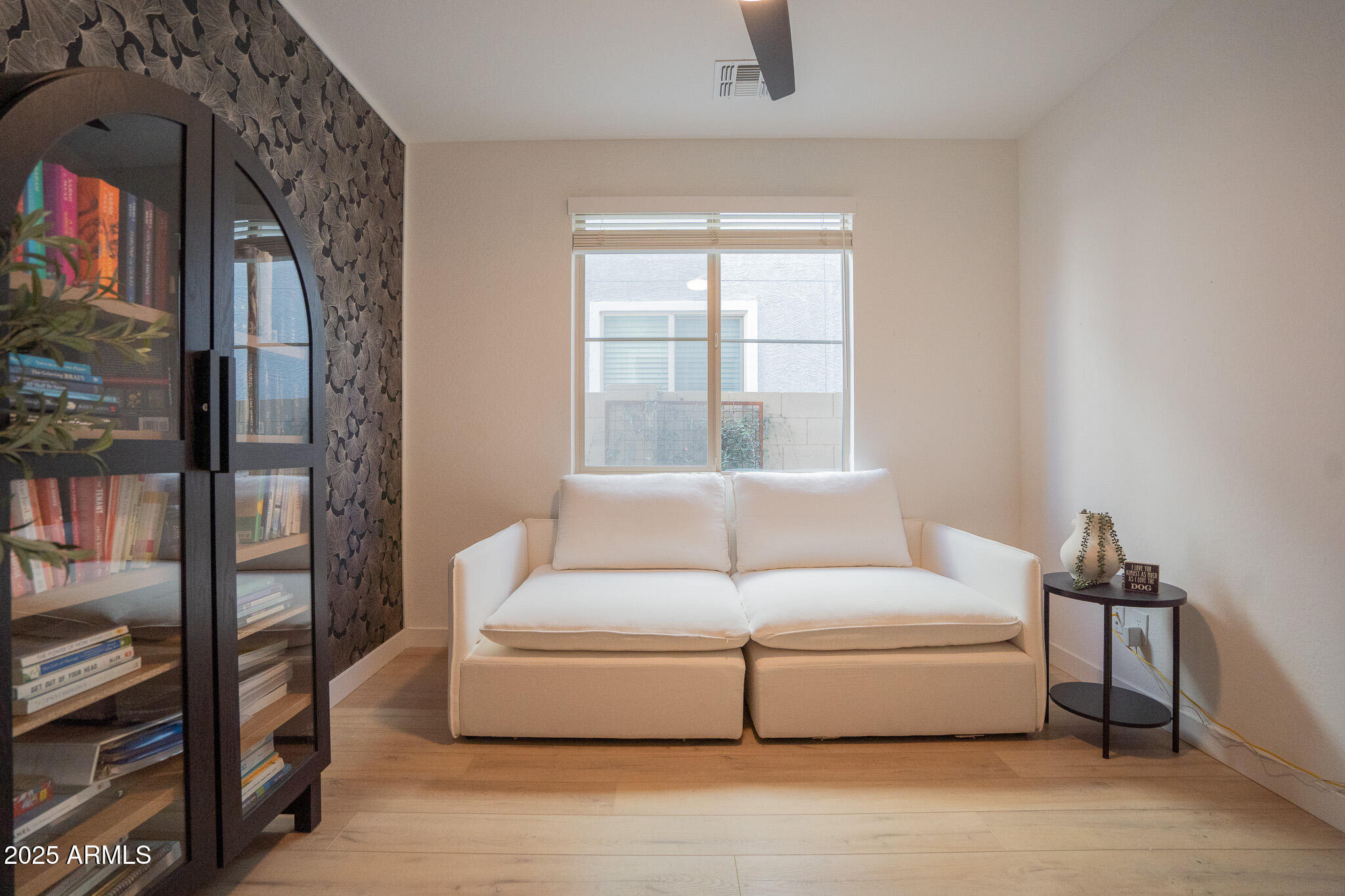10050 East Tiburon Avenue Mesa, AZ 85212 - Photo 16 of 47 a living room with furniture and a window
