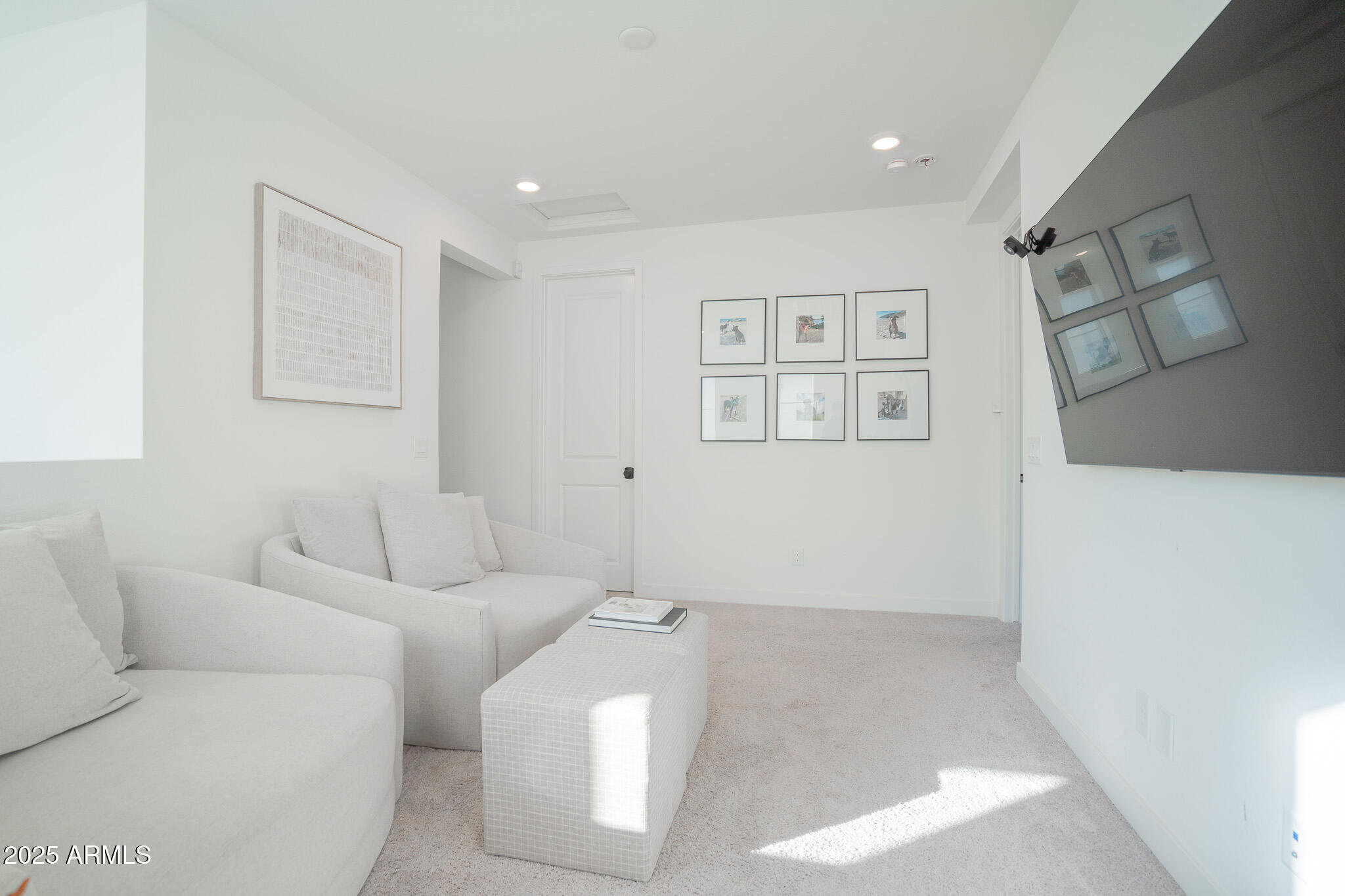 10050 East Tiburon Avenue Mesa, AZ 85212 - Photo 19 of 47 a living room with furniture and wall paintings