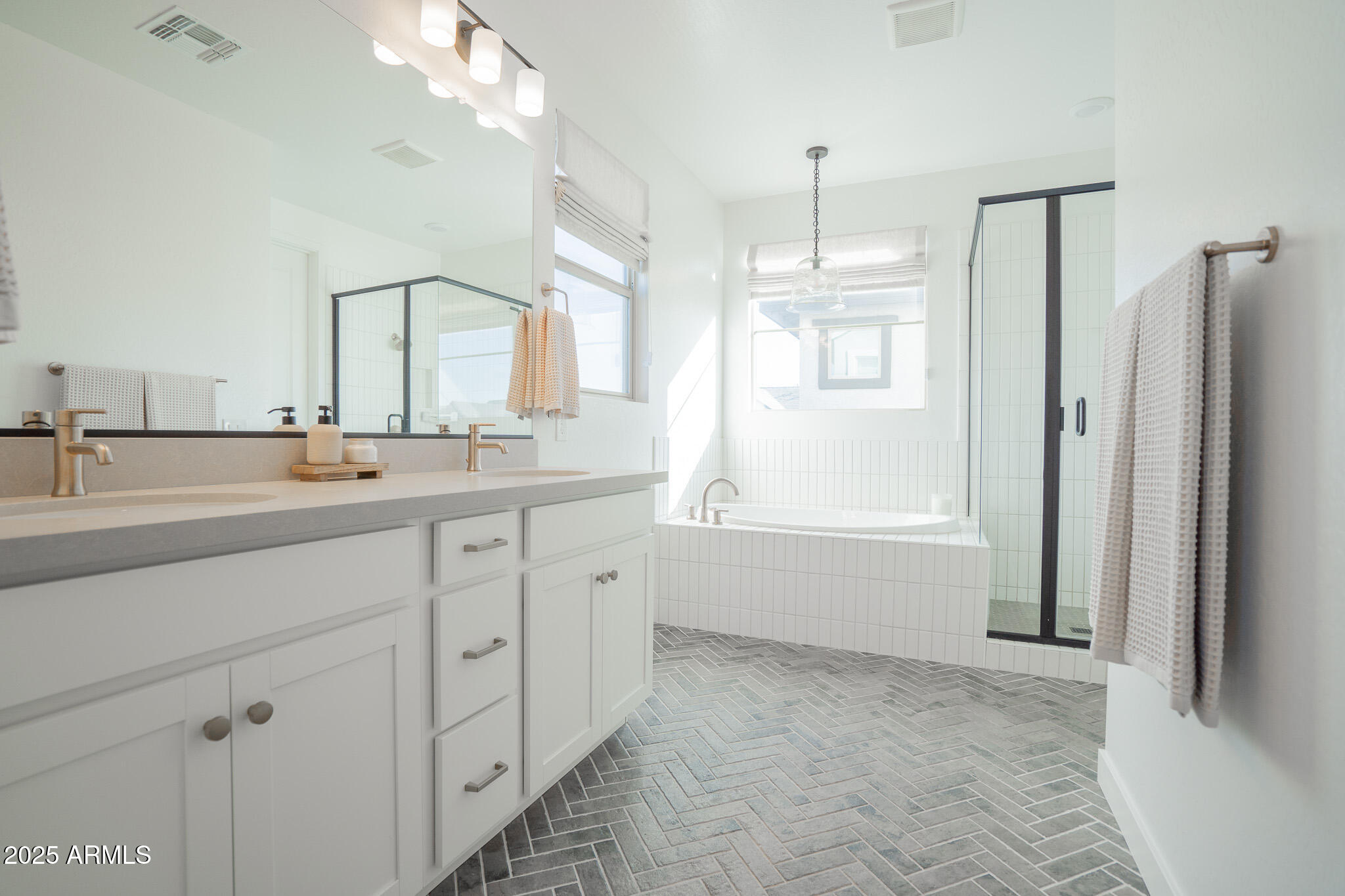 10050 East Tiburon Avenue Mesa, AZ 85212 - Photo 25 of 47 a spacious bathroom with a double vanity sink mirror and double