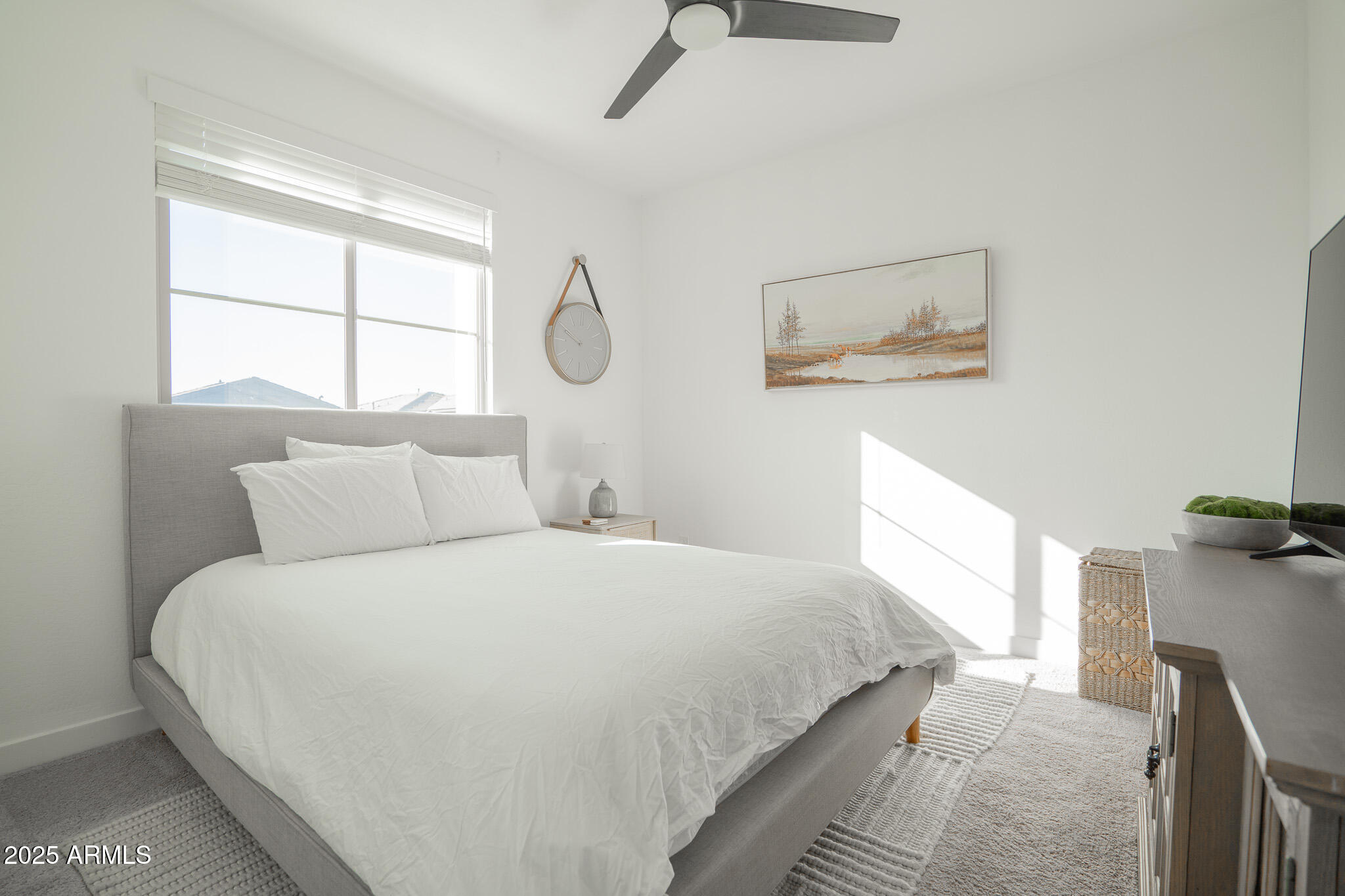 10050 East Tiburon Avenue Mesa, AZ 85212 - Photo 33 of 47 a bedroom with a bed and a window