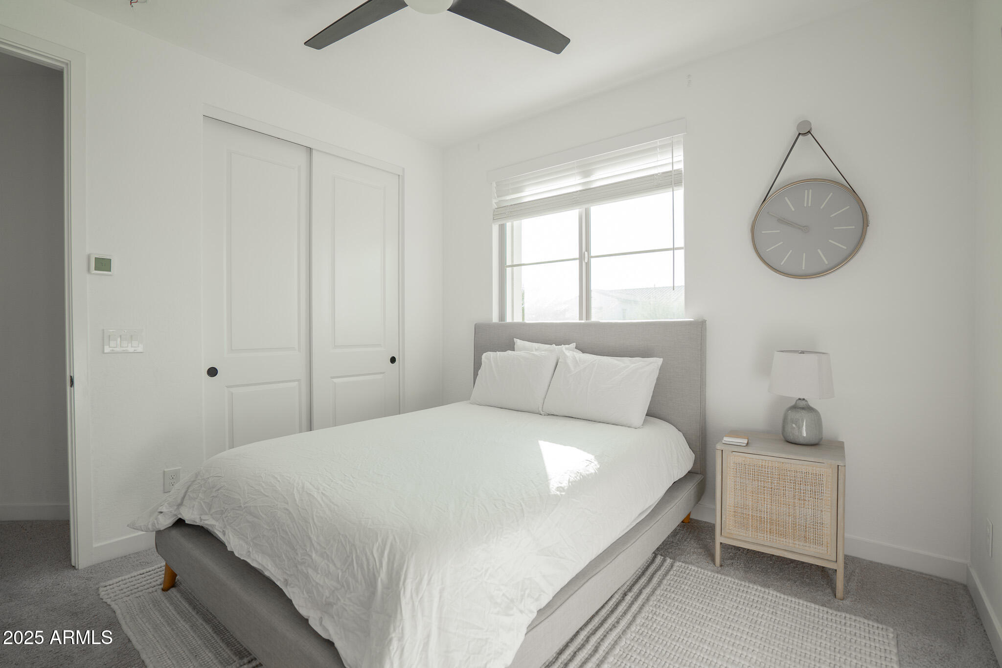 10050 East Tiburon Avenue Mesa, AZ 85212 - Photo 34 of 47 a bedroom with a bed and window