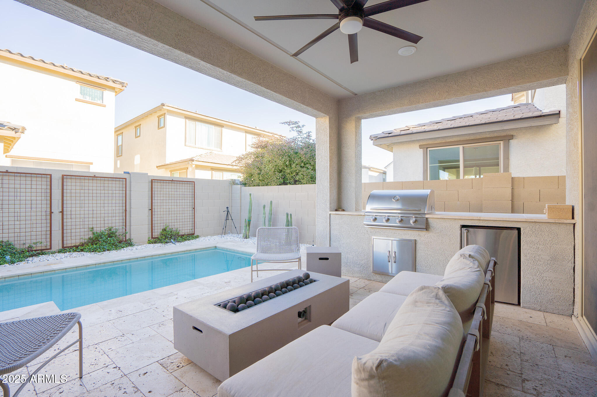 10050 East Tiburon Avenue Mesa, AZ 85212 - Photo 39 of 47 a kitchen with stainless steel appliances granite countertop a stove and a refrigerator