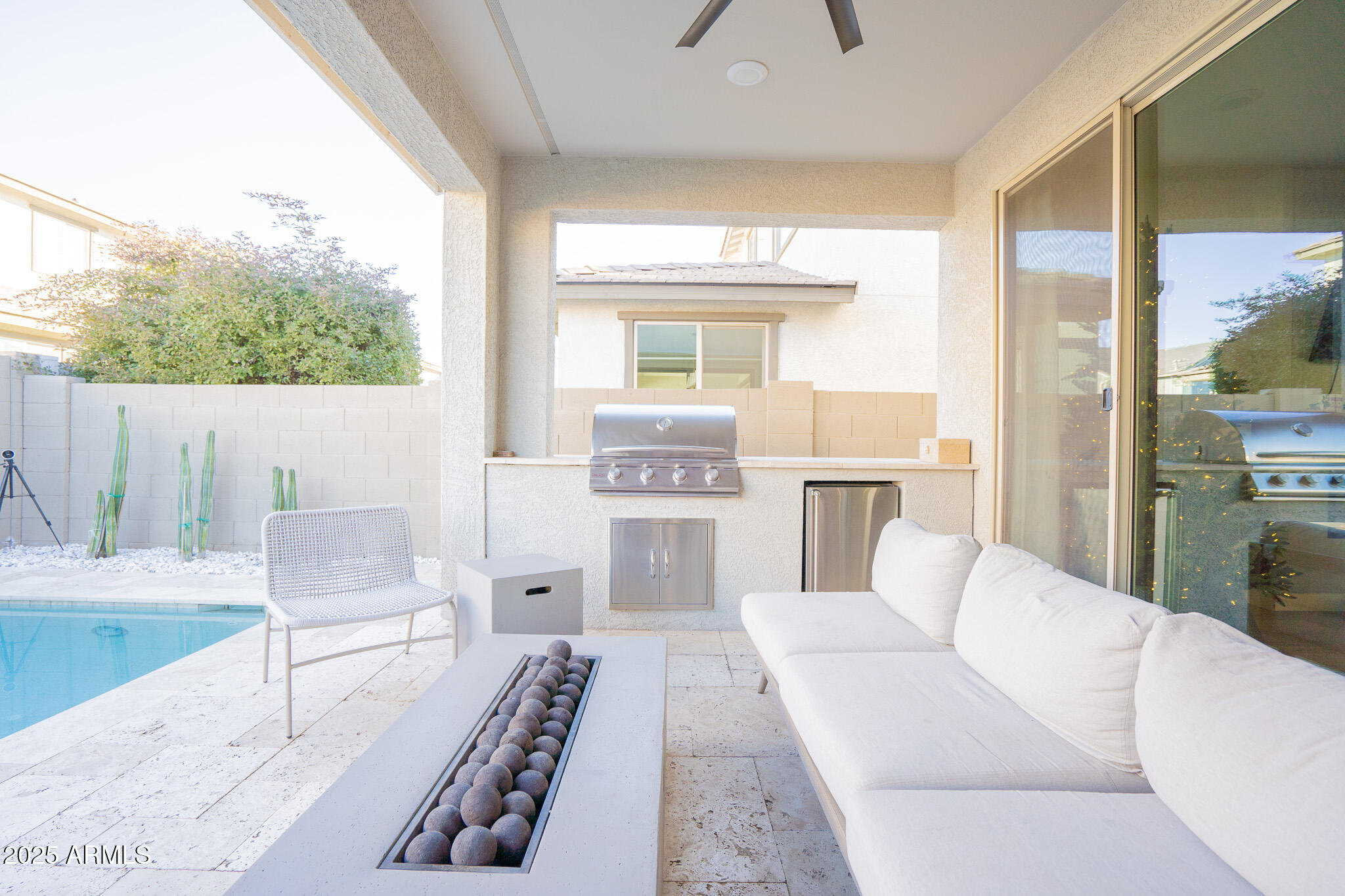 10050 East Tiburon Avenue Mesa, AZ 85212 - Photo 40 of 47 a living room with furniture and a large window