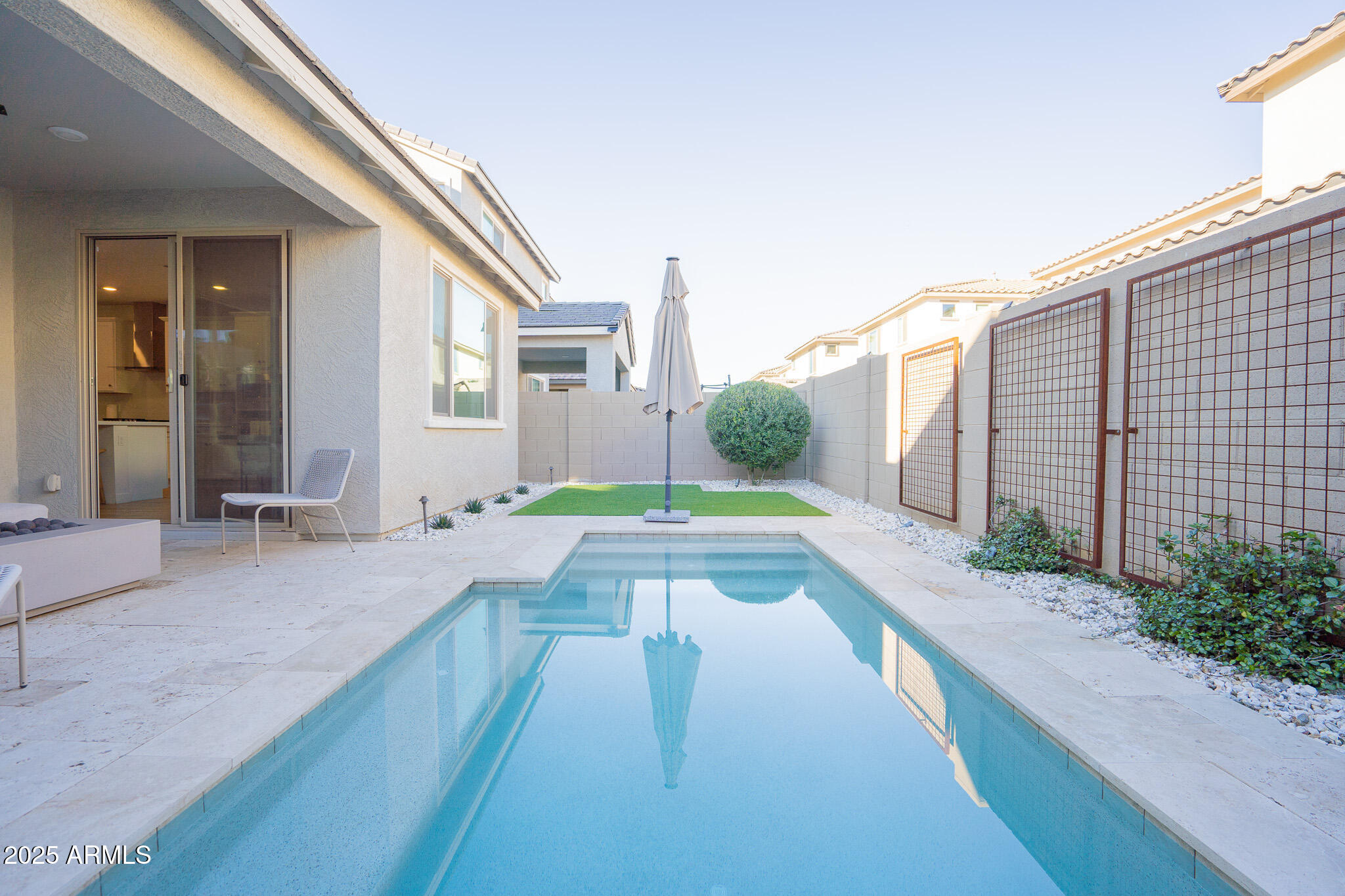 10050 East Tiburon Avenue Mesa, AZ 85212 - Photo 42 of 47 a view of swimming pool with a yard