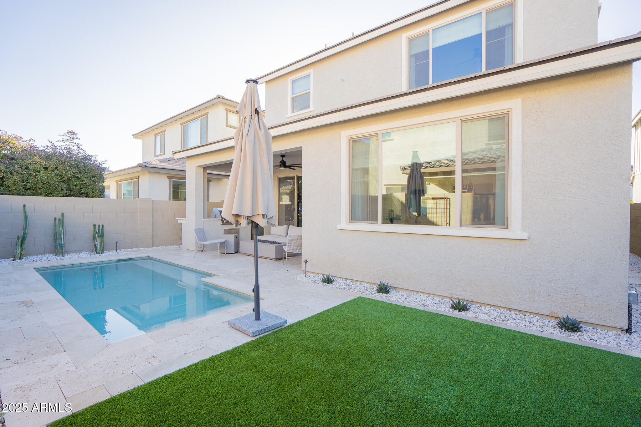 10050 East Tiburon Avenue Mesa, AZ 85212 - Photo 44 of 47 a view of a house with a swimming pool