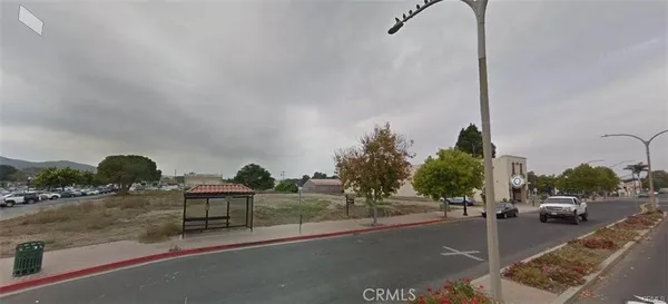 a view of a street with cars