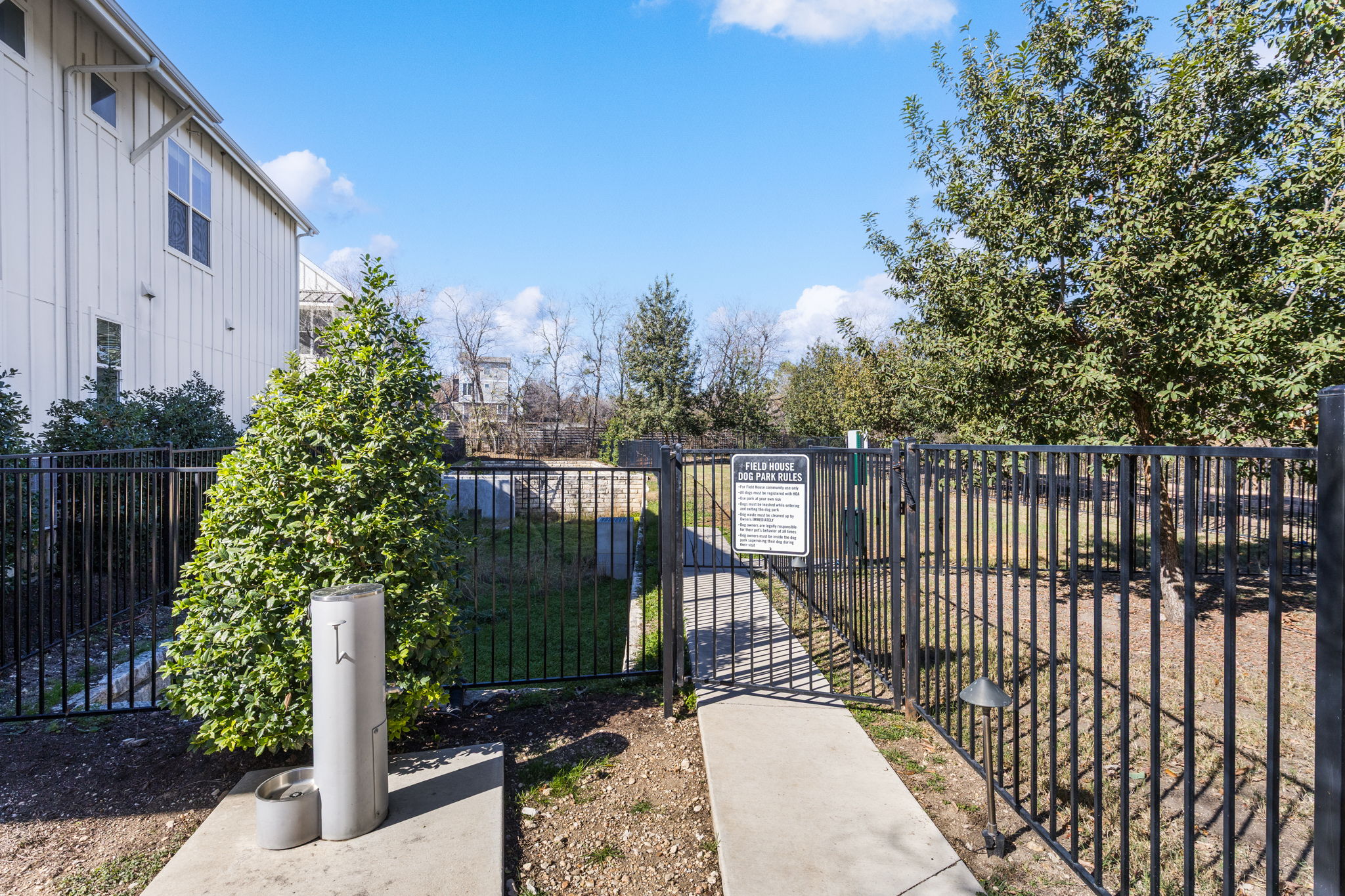 2624 Metcalfe Road, Unit 17 Austin, TX 78741 - Photo 32 of 35 a view of a wrought iron fences in front of house