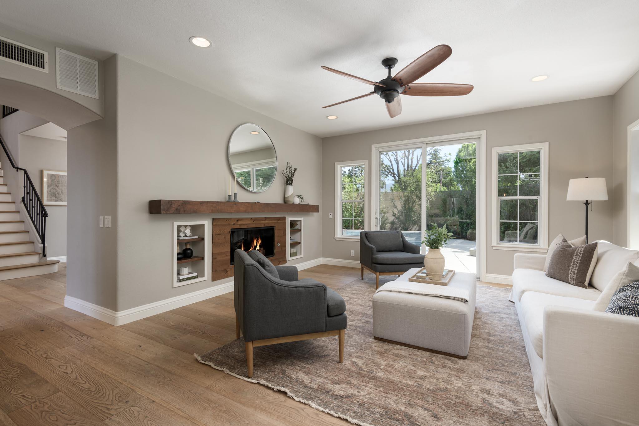 200 Oak View Lane Santa Barbara, CA 93111 - Photo 12 of 35 a living room with furniture and a fireplace