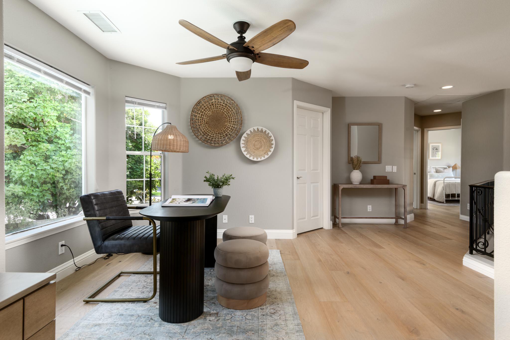 200 Oak View Lane Santa Barbara, CA 93111 - Photo 14 of 35 a living room with furniture a fireplace and a large window