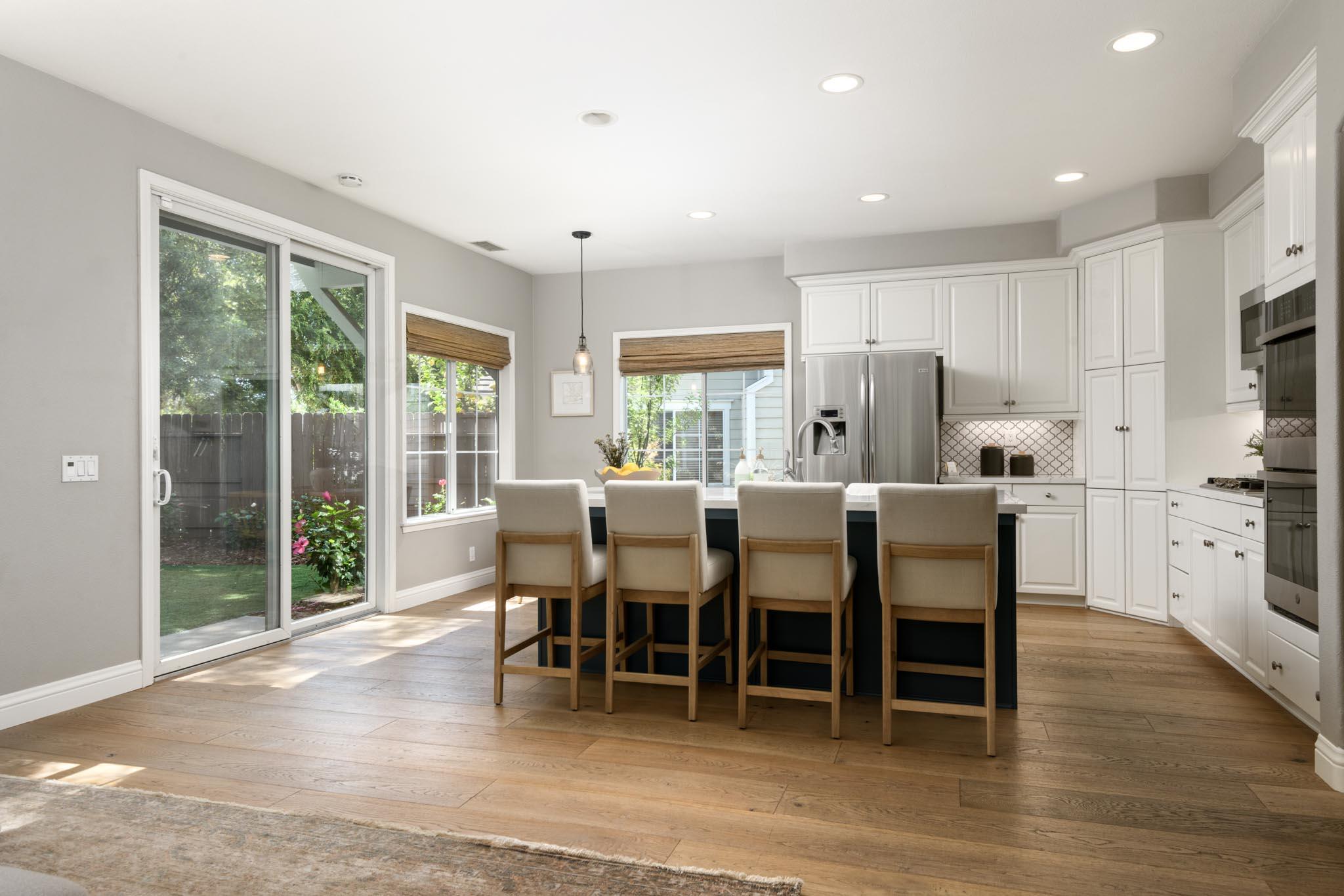 200 Oak View Lane Santa Barbara, CA 93111 - Photo 8 of 35 a view of a dining room with furniture window and wooden floor