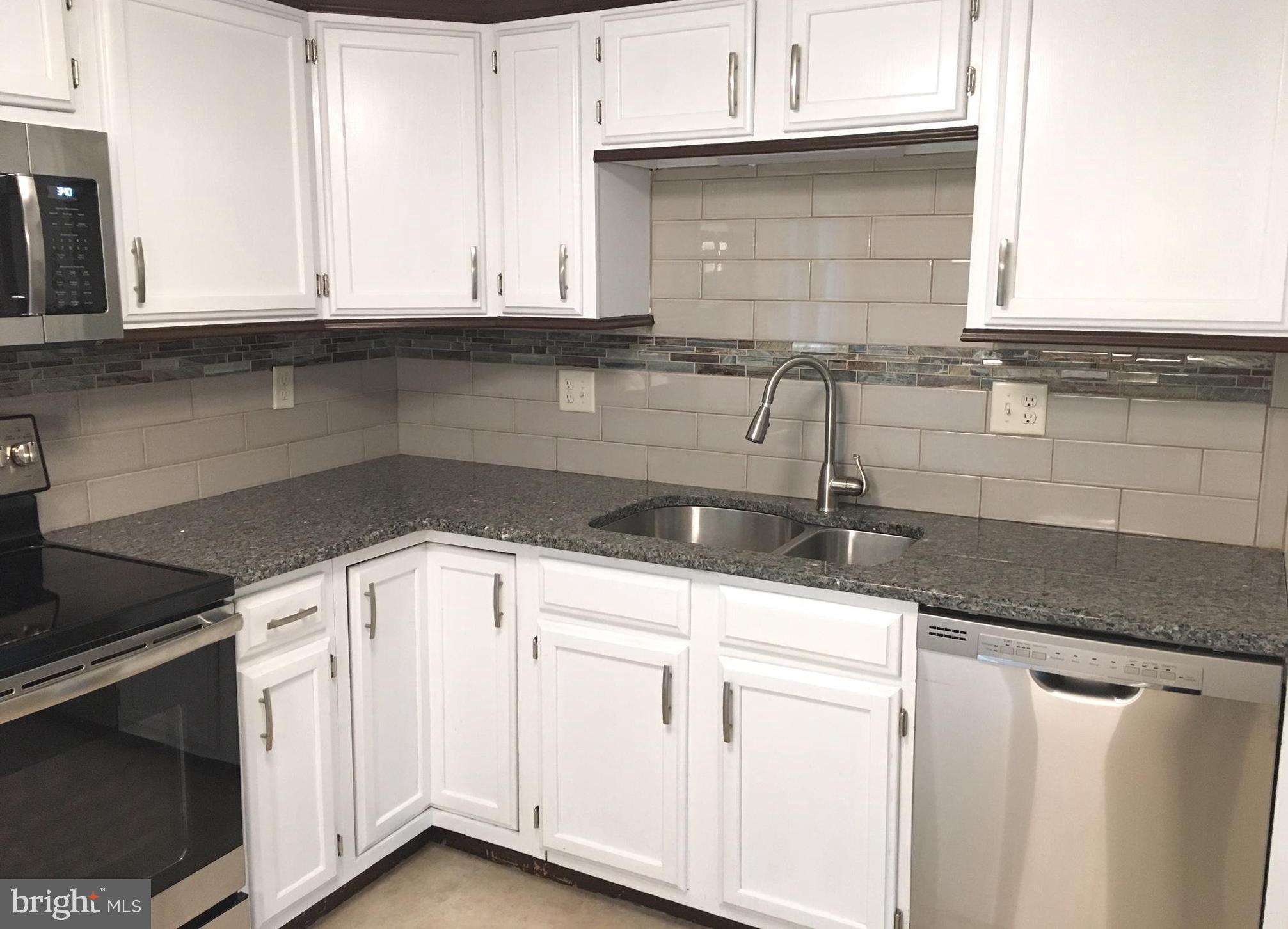 175 Codjus Drive Rising Sun, MD 21911 - Photo 2 of 4 Kitchen with granite and stainless steel