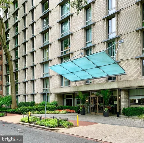 a view of a building with a garden