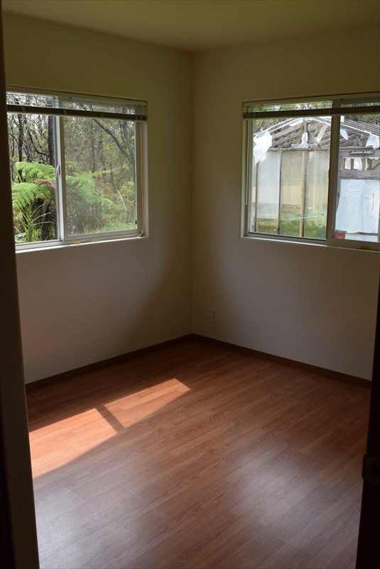 11-2855 Kaleponi Road Mountain View, HI 96771 - Photo 12 of 19 an empty room with a window