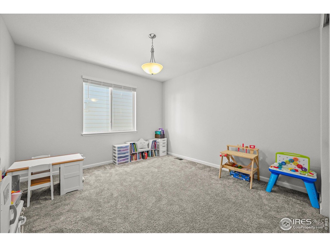 950 Rustling Street Windsor, CO 80550 - Photo 11 of 49 Main Floor Bedroom