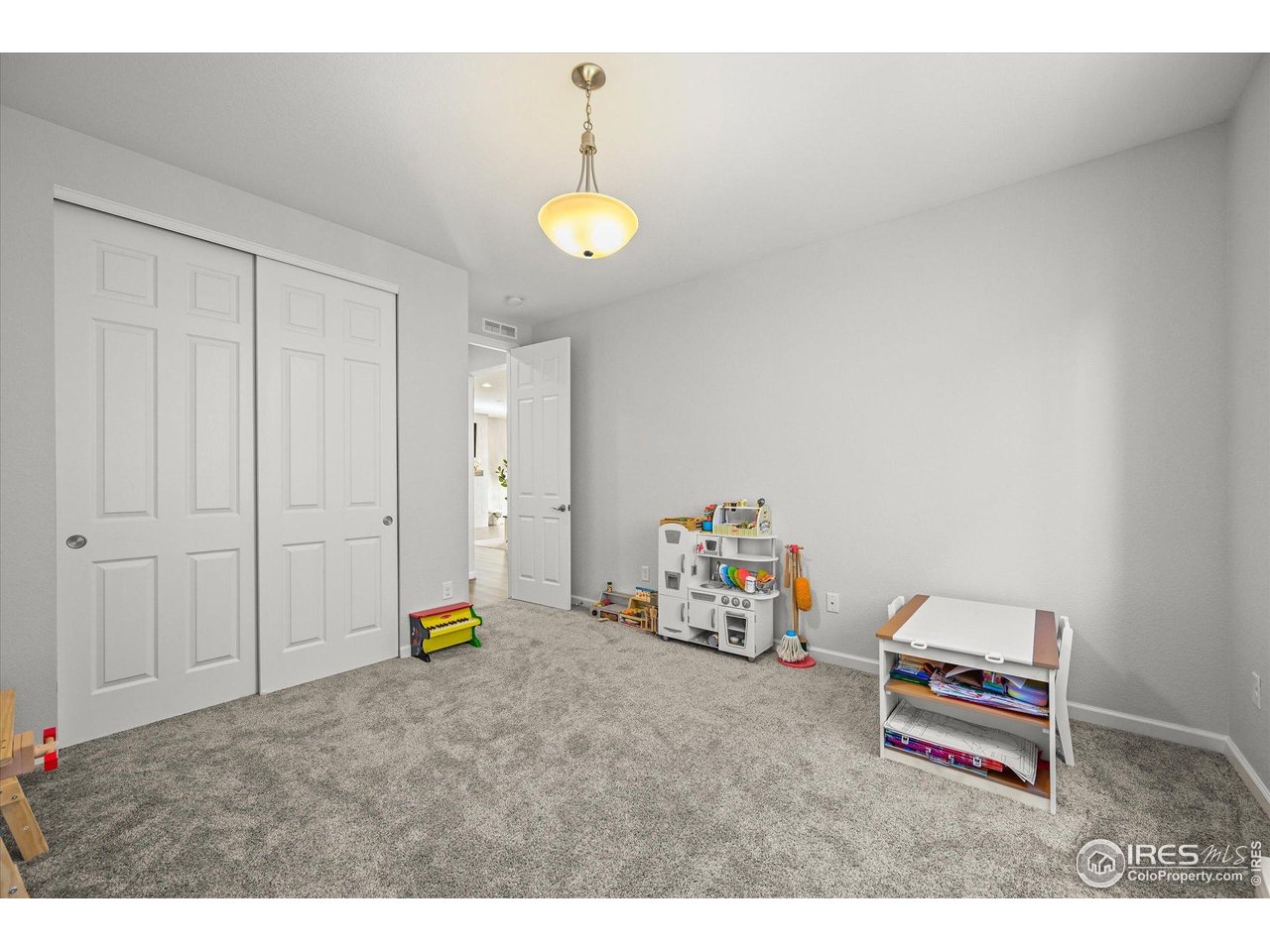 950 Rustling Street Windsor, CO 80550 - Photo 12 of 49 Main Floor Bedroom