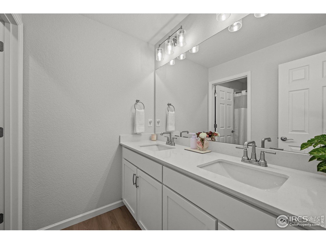 950 Rustling Street Windsor, CO 80550 - Photo 34 of 49 Shared upstairs bathroom with separate shower room