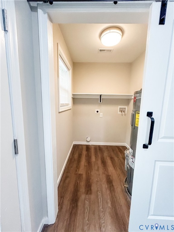 10295 Ashcake Road Ashland, VA 23005 - Photo 21 of 24 Dedicated utility space featuring wood-finish floo