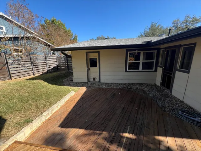 a view of house with yard