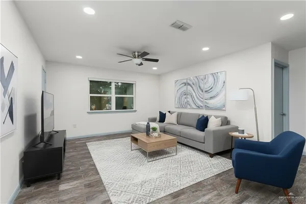 a view of an empty room with a window