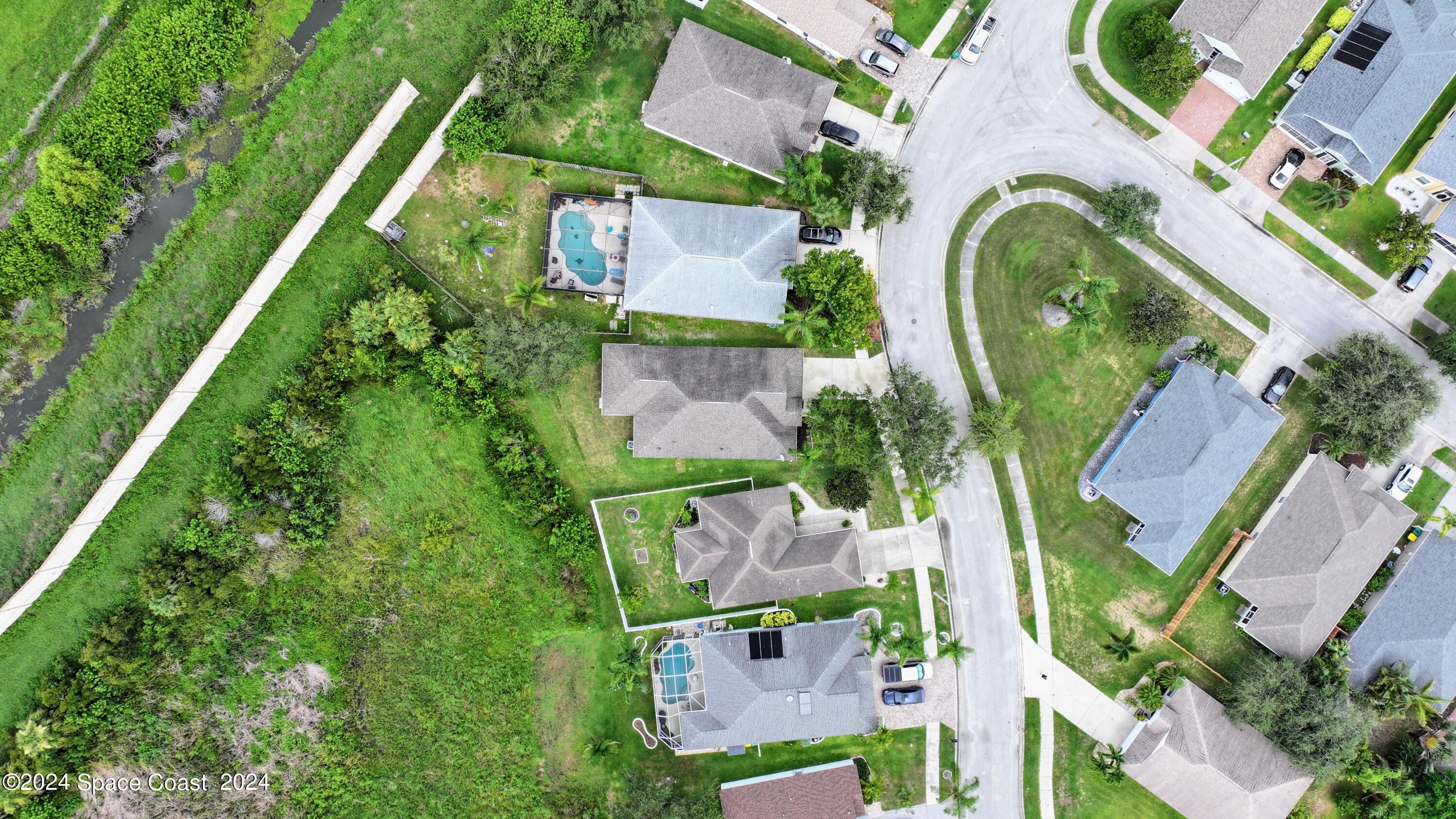 2237 Deercroft Drive Melbourne, FL 32940 - Photo 50 of 53 DJI_20240710120852_0018_D