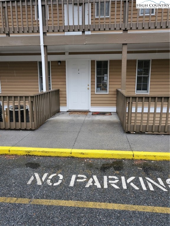 a view of swimming pool with outdoor seating and yard