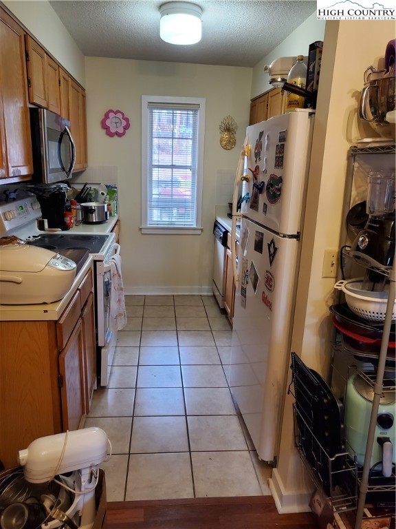 116 Grand Boulevard, Unit 1J Boone, NC 28607 - Photo 3 of 17 a storage room with cabinets