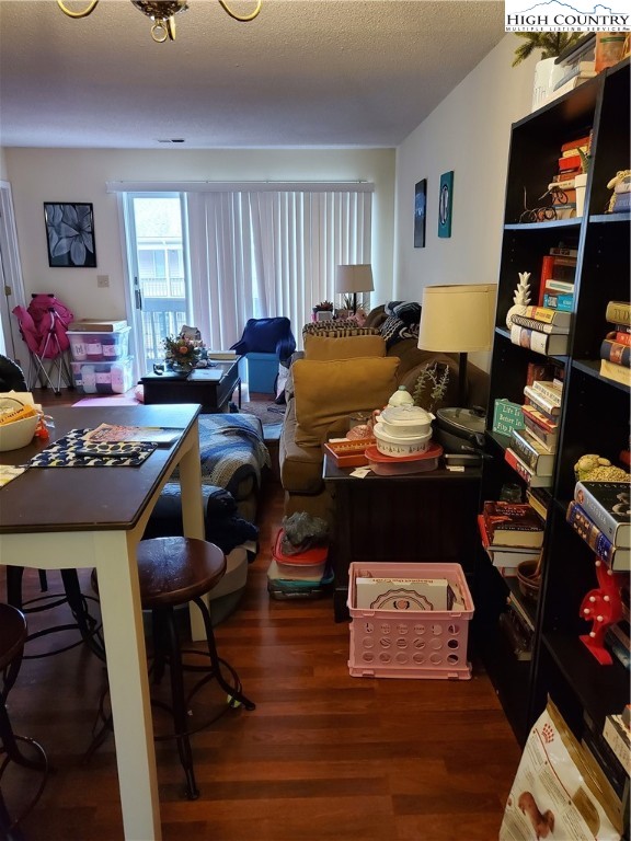 116 Grand Boulevard, Unit 1J Boone, NC 28607 - Photo 4 of 17 a living room with furniture and a window