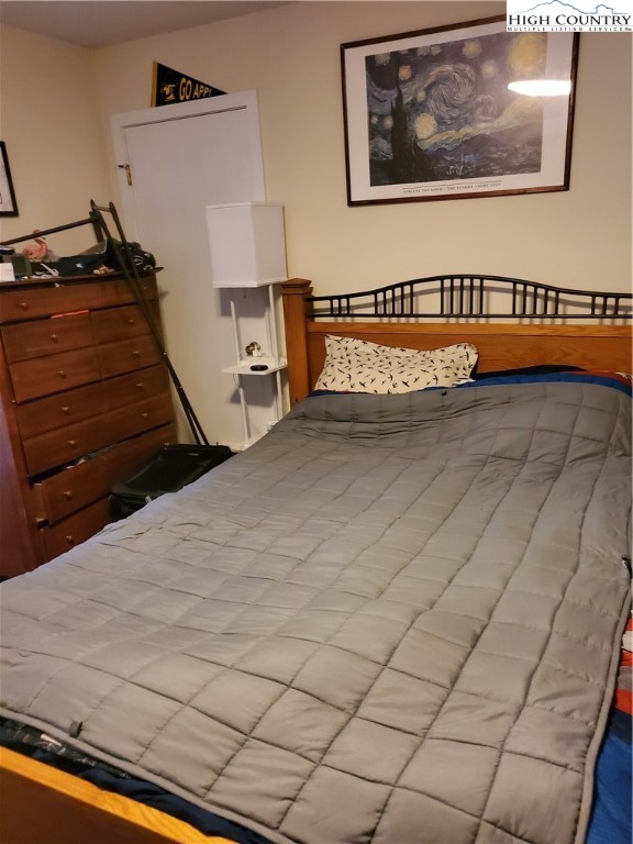 116 Grand Boulevard, Unit 1J Boone, NC 28607 - Photo 8 of 17 a view of a room with painting on the wall