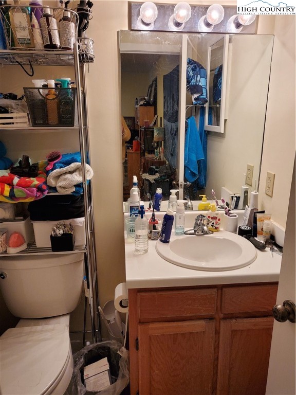 116 Grand Boulevard, Unit 1J Boone, NC 28607 - Photo 10 of 17 a bathroom with a sink toilet and shower