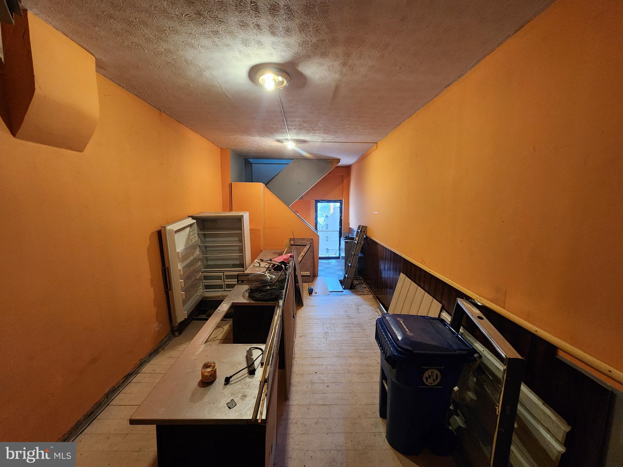 526 North Chester Street Baltimore, MD 21205 - Photo 4 of 26 a view of living room with furniture and stairs