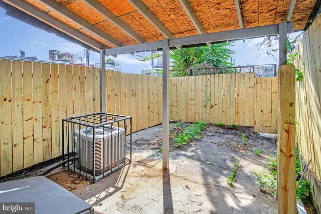 a view of a door with a sink and a yard