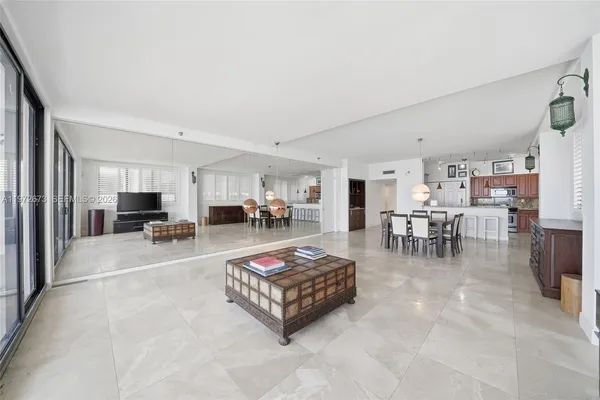 a living room with furniture and a table