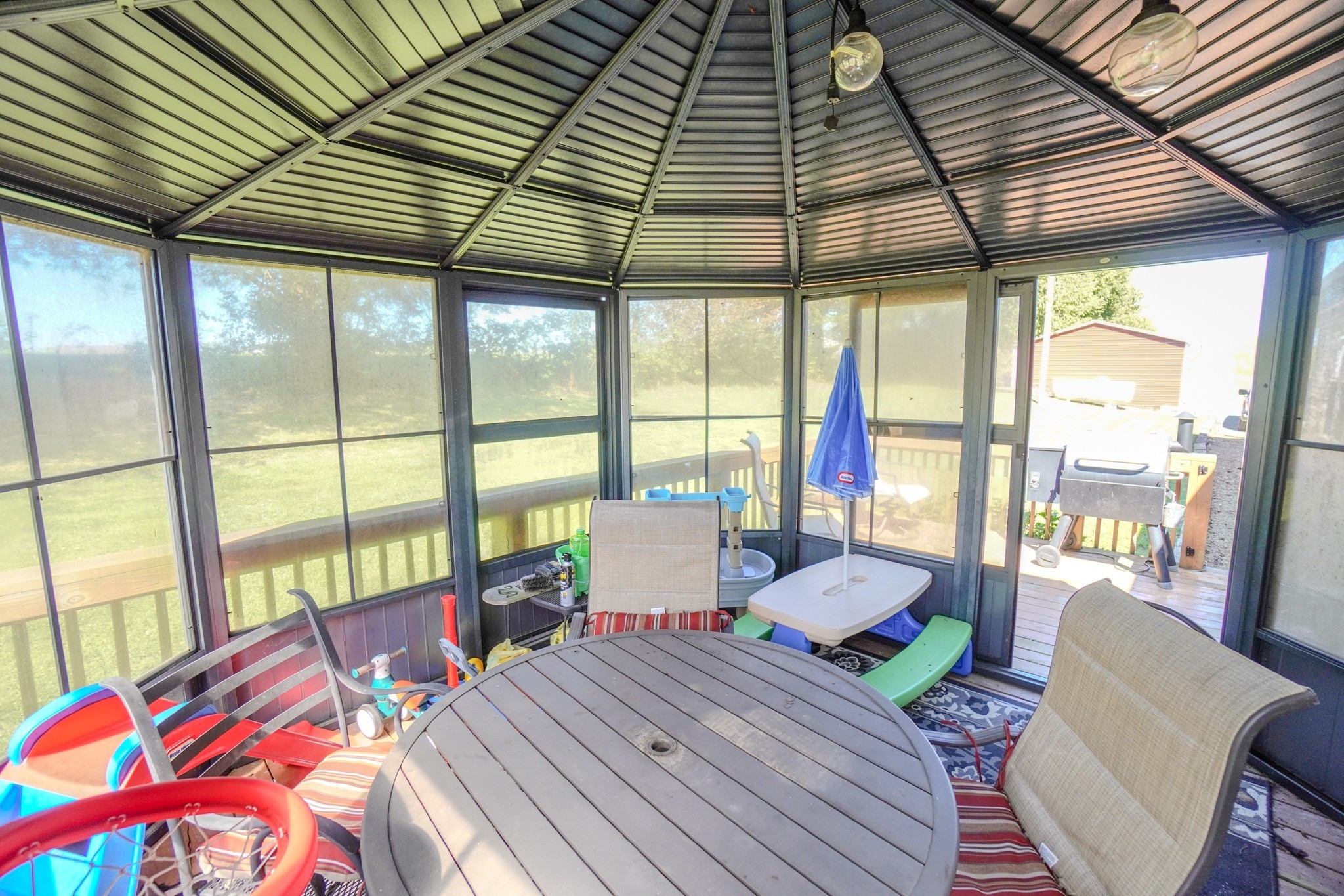 137 Hawkins Road Westmoreland, TN 37186 - Photo 20 of 70 a bedroom with a bed and wooden floor