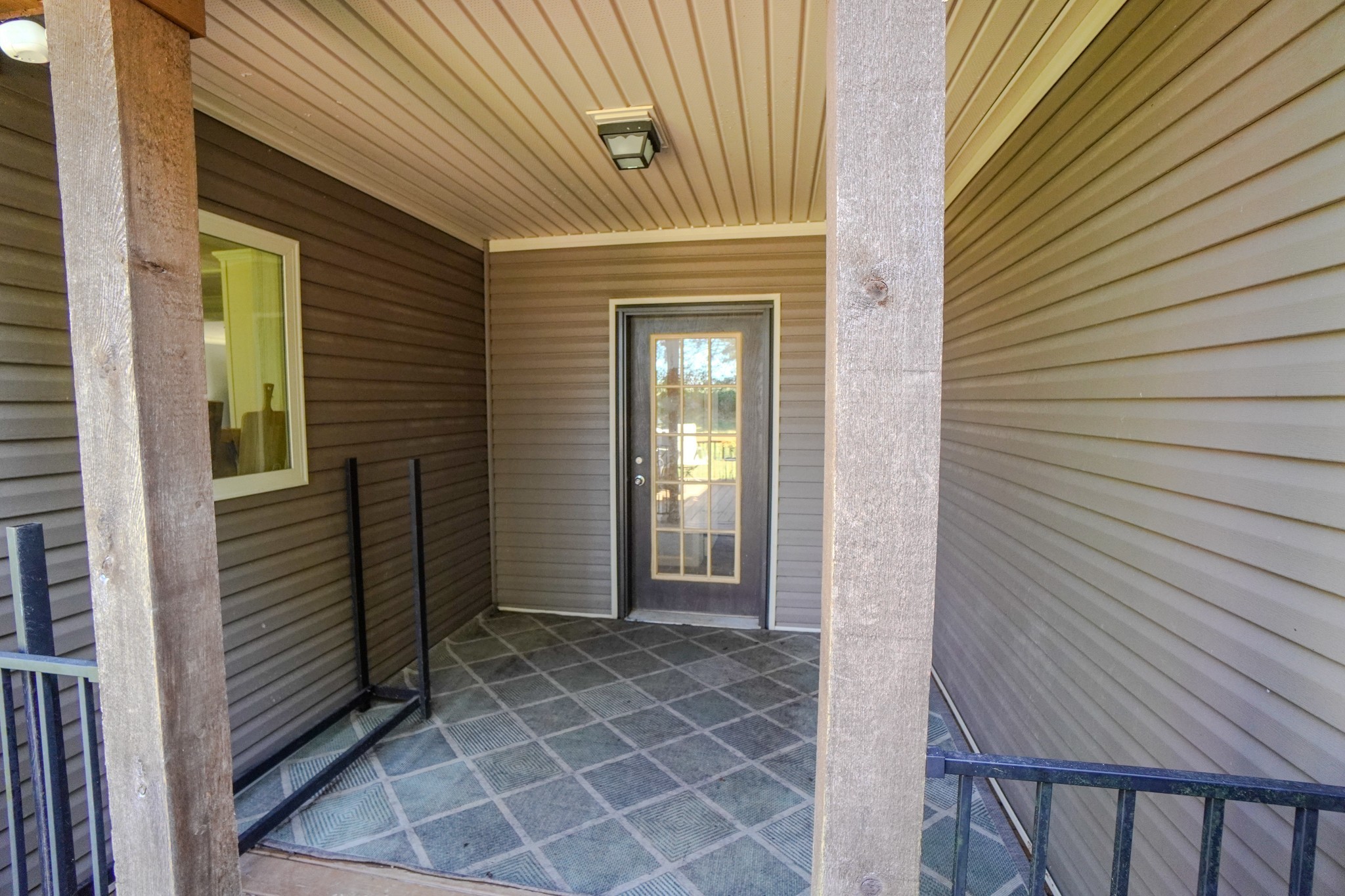 137 Hawkins Road Westmoreland, TN 37186 - Photo 21 of 70 a view of a entryway door front of a house